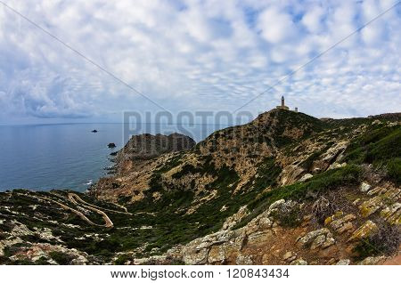 Lighthouse at Capo Sandalo on west coast of San Pietro island, Sardinia