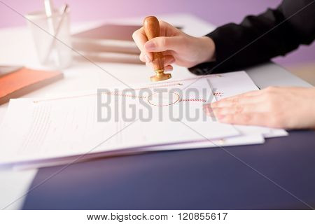 Notary Public Stamping The Document