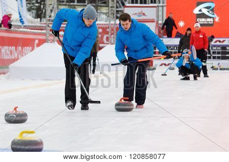 Curling Players Kirill Savenkov (l) And Alexey Kulikov (r)