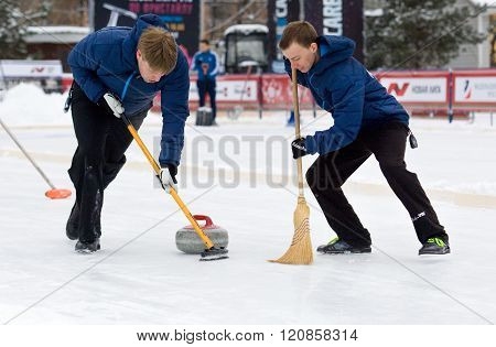 Curling Players D. Abanin (l) And A. Kirikov (r)