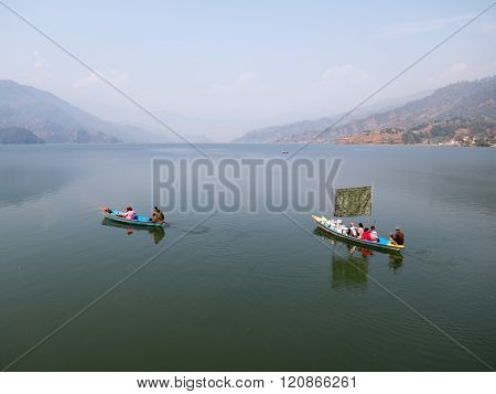 Boaters On A Lake
