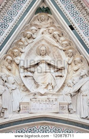 FLORENCE, ITALY - JUNE 05: Virgin Mary seated, surrounded by angels, Portal of Cattedrale di Santa Maria del Fiore (Cathedral of Saint Mary of the Flower), Florence, Italy on June 05, 2015