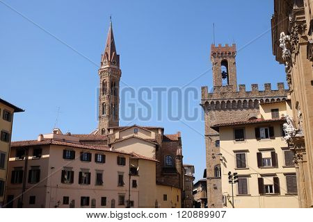 FLORENCE, ITALY - JUNE 05: Bell tower of the Badia Fiorentina church and the Volognana Tower of the Palazzo del Bargello in Florence, Tuscany, Italy, on June 05, 2015