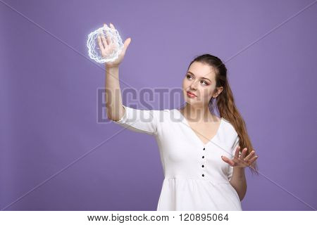 Woman with glowing magical energy ball.