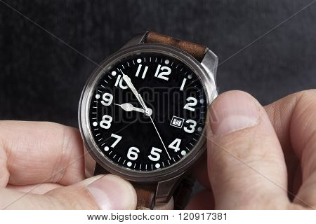 Man hand  watch with leather strap
