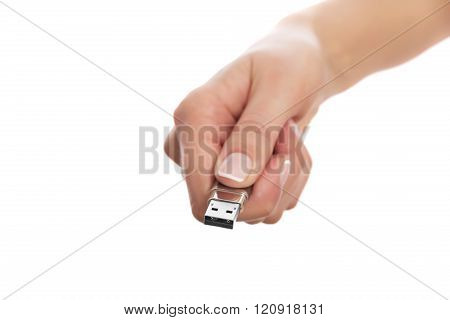 Flash drive in hand isolated on white background.