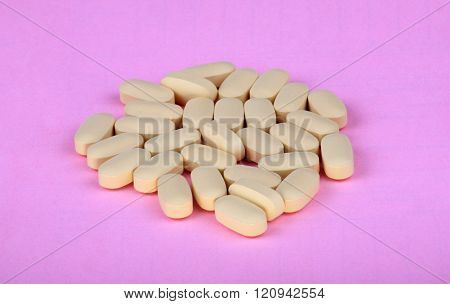 Hiv Therapy Pills On Pink Background