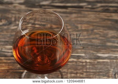 Cognac, brandy or whiskey in large round glass