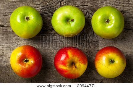 Ripe Red And Green Apples On An Old Wooden Background
