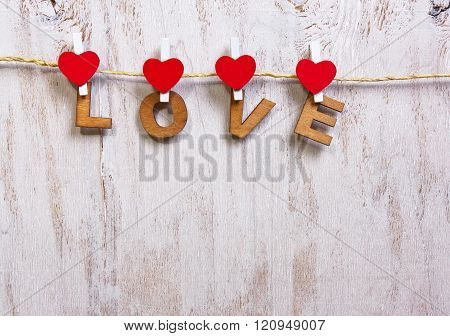 Wood Letters And Heart Forming Word Love