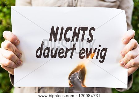 Woman Is Holding A Burning Paper With Text