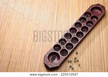 Congkak  is a traditional game in asia