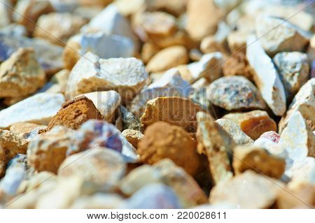 The texture of colorful gravel or macadam, background, close-up
