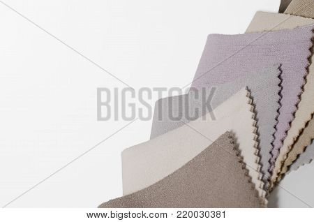 Bright collection of velour textile samples. Multicolor Fabric texture background.