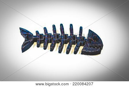 Abstract object of a blue color printed by 3d printer on white background. Fused deposition modeling, FDM. Progressive modern additive technology. Concept of 4.0 industrial revolution