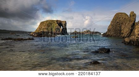 Elelphant Rock - A rock formation in the shape of a rock found in Northern Ireland near Ballintoy Harbour.