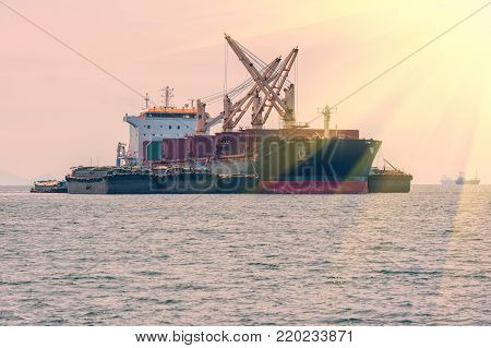oil tanker, gas tanker in the high sea.Refinery Industry cargo ship,aerial view,Thailand, in import export, LPG,oil refinery, Logistics and transportation with working crane bridge in harbor
