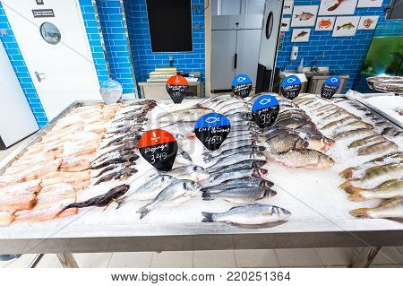 Samara, Russia - November 19, 2017: Raw and frozen fish ready for sale in the supermarket