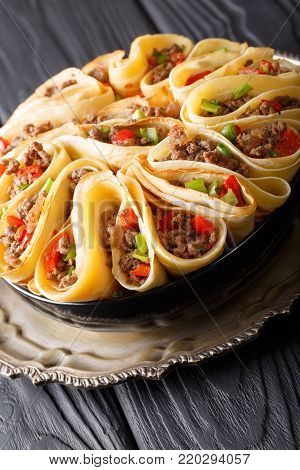 Pancakes Stuffed With Meat Beef, Peppers And Onions Closeup. Horizontal Top View
