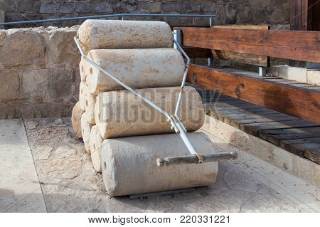 Near Kfar Adumim, Israel, November 25, 2017 : Rollers for compressing plaster on roofs and floors from the Hellenistic period in The Good Samaritan Museum Near Kfar Adumim in Israel