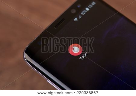 New york, USA - January 2, 2018: Tinder  application icon on smartphone screen close-up. Tinder  app icon with copy space on screen