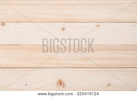 White Finland pine wood woodgrain texture background in natural beige brown color