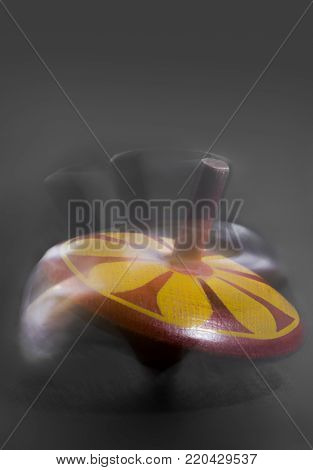 spinning top, rotation, speed, color, wooden toy, blur, vitage toy, conceptual,