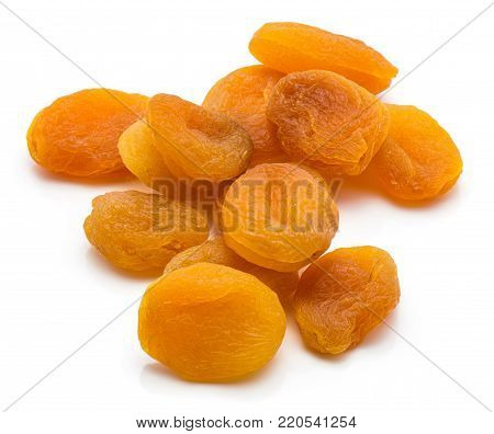 Whole dried apricots isolated on white background