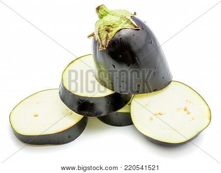 Sliced eggplant (aubergine), cut in round circles, isolated on white background