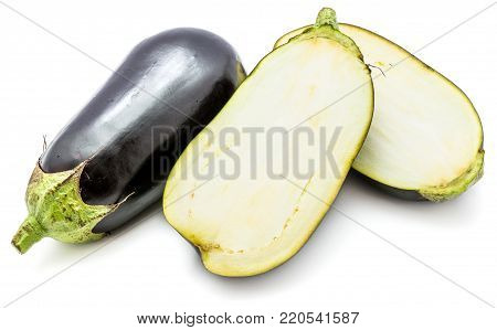 One whole and two halves eggplant (aubergine), longitudinal section, isolated on white background