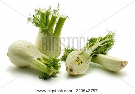 Sliced florence fennel isolated on white background two whole bulbs two fresh halves