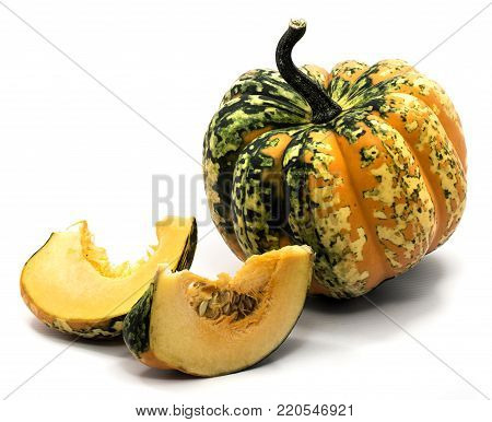 One whole spotty green yellow pumpkin, two slices with seeds isolated on white background