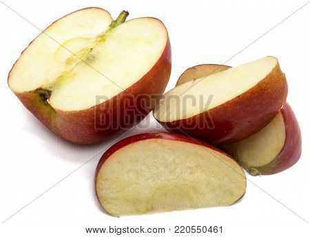 One half Kanzi apple, three slices, isolated on white background