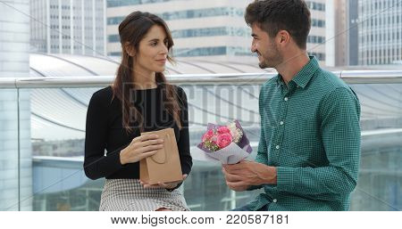 Caucasian couple exchage gift