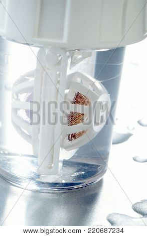 colored contact lenses in container over white