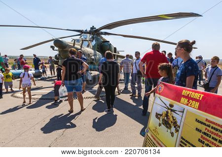 KADAMOVSKIY TRAINING GROUND, ROSTOV REGION, RUSSIA, 26 AUGUST 2017: International military technical forum «ARMY-2017». Attack helicopter «Mi-28N» «Night Hunter» and the show visitors