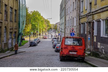 Vyborg, Russia - Oct 6, 2016. Cars parking at downtown in Vyborg, Russia. Vyborg stands at the head of Vyborg Bay of the Gulf of Finland, 113 km northwest of St. Petersburg.
