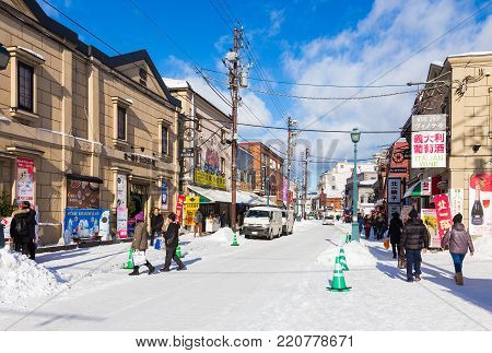 Otaru, Hokkaido, Japan - 30 December 2017, Famous Otaru city fills with tourists and visitors around the world on bright sunny and cold winter day of December 30, 2017 in Otaru, Hokkaido, Japan