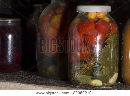 home preservation in a dark cellar in which breaks through several rays of light close up