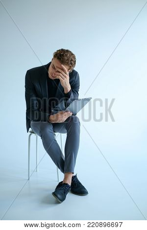 tired withdrawn sad man. bad news failure stress concept. Alone with the problems.