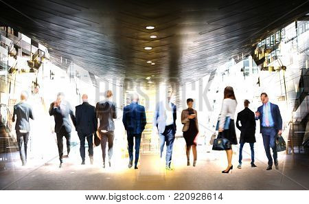 People walking in the city of London. Blurred background with spate for text