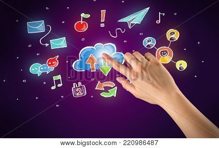 Female hand toucing mixed media icons with purple background