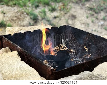 Fire In Fireplace. Grilling, Cooking And Eating Outdoors