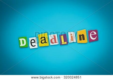 A Word Writing Text - Deadline. Colored Letters On A Blue Background. Caption On Card. Banner With C