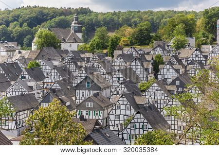 White Half Timbered Houses Of The Historic Town Freudenberg, Germany