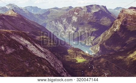 Tourism Vacation And Travel. Fantastic View On Geirangerfjord And Mountains Landscape From Dalsnibba