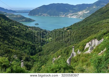 Monument Rocks (chalk Pyramids) Of Zone At Lake Iseo In Italy