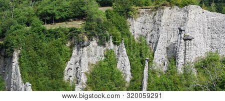 Monument Rocks (chalk Pyramids) Of Zone At Lake Iseo In Italy