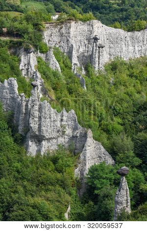Monument Rocks (chalk Pyramids) Of Zone At Lake Iseo In Italy