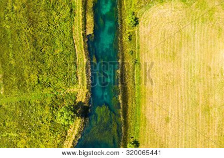 Beautiful Gacka River Between Green Fields, Aerial Summer View, Lika Region Of Croatia, Overhead Vie